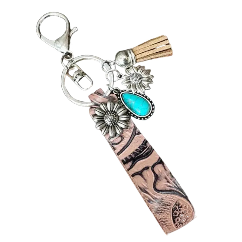 EMBOSSED LEATHER KEYCHAIN WITH CHARMS
