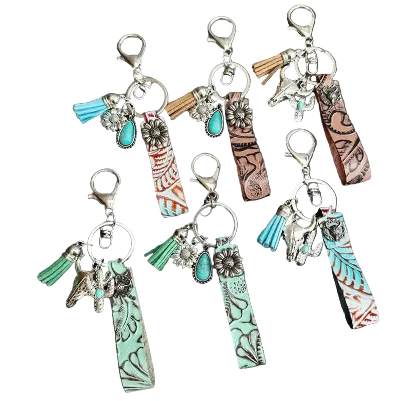 EMBOSSED LEATHER KEYCHAIN WITH CHARMS