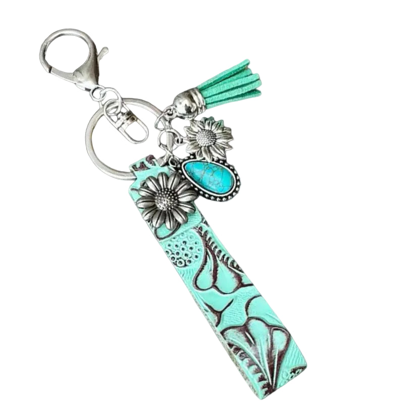 EMBOSSED LEATHER KEYCHAIN WITH CHARMS